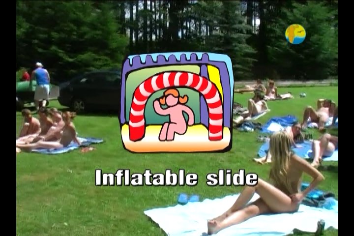 Green grass, inflatable slides and family nudism